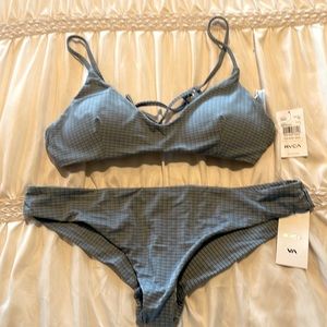 Never worn! Periwinkle RVCA bikini. NOTE: Small top/large bottom.